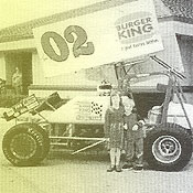 Al Children's SurgiKids Patients standing in from of Gene Lasker's Race Car